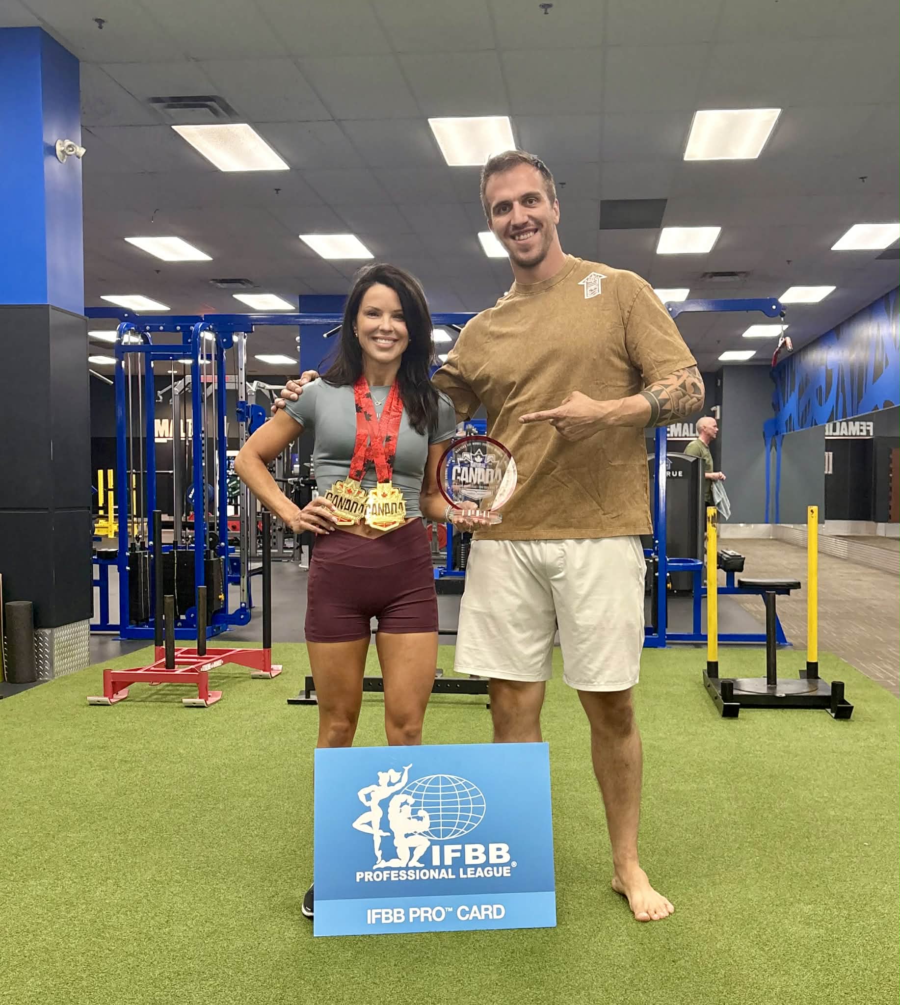 Melissa & Zach at A foot Above Fitness Celebrating her IFBB Pro card