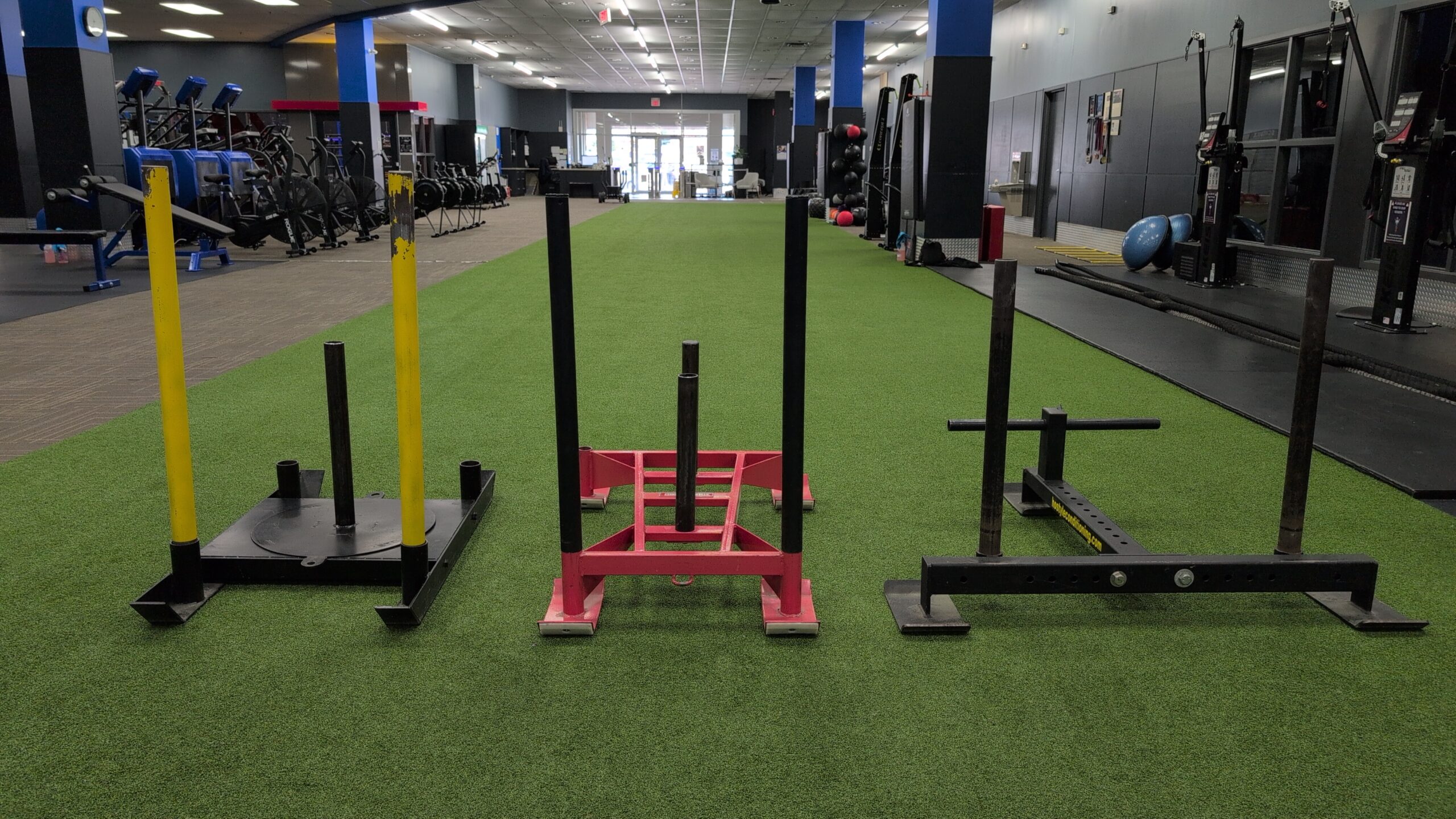 Sleds on Turf at A Foot Above Fitness